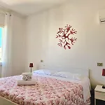 Bentos - In Centro A Hébergement de vacances Orosei